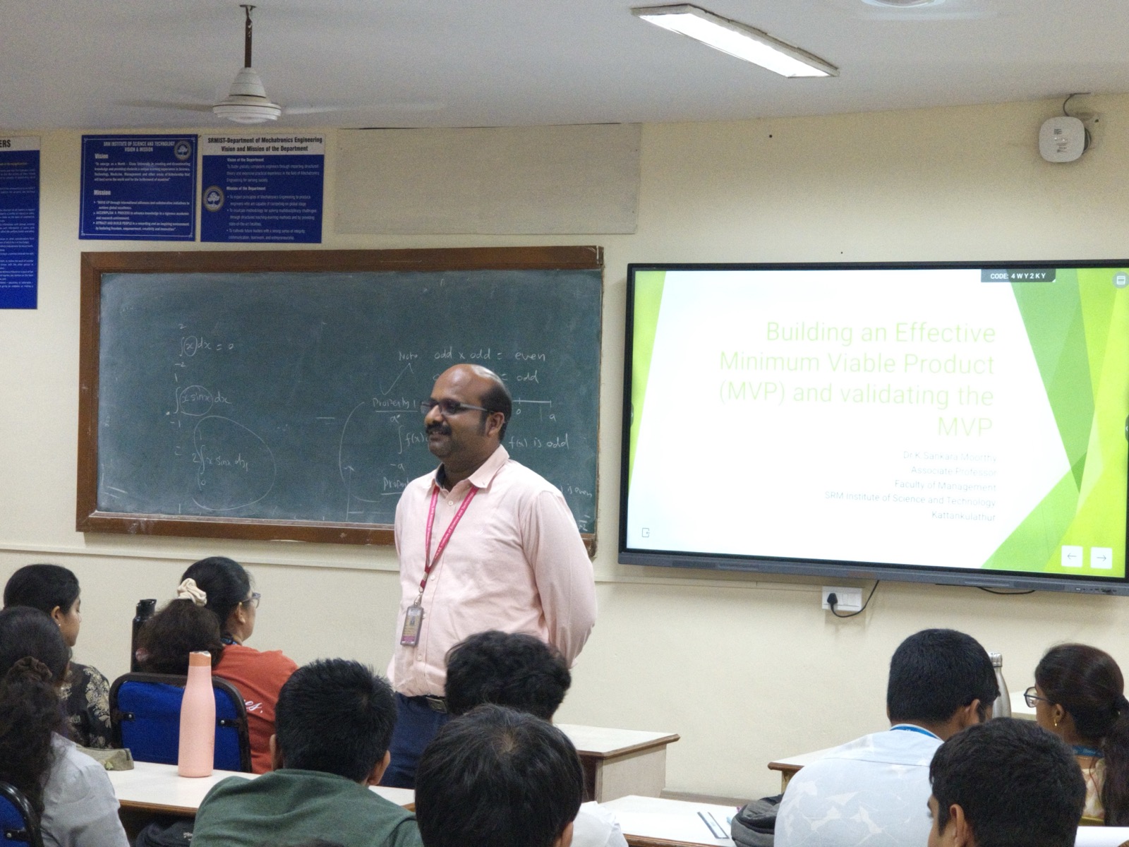 Speaker presenting on building an effective MVP and validating it with real users