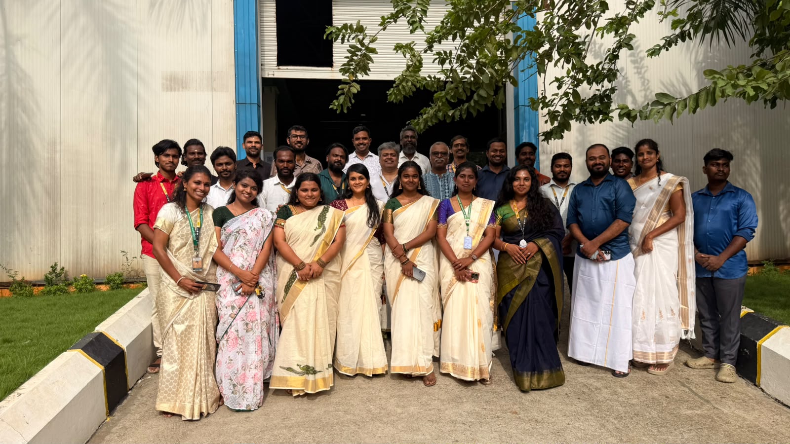 DEI team celebrating Onam in traditional attire