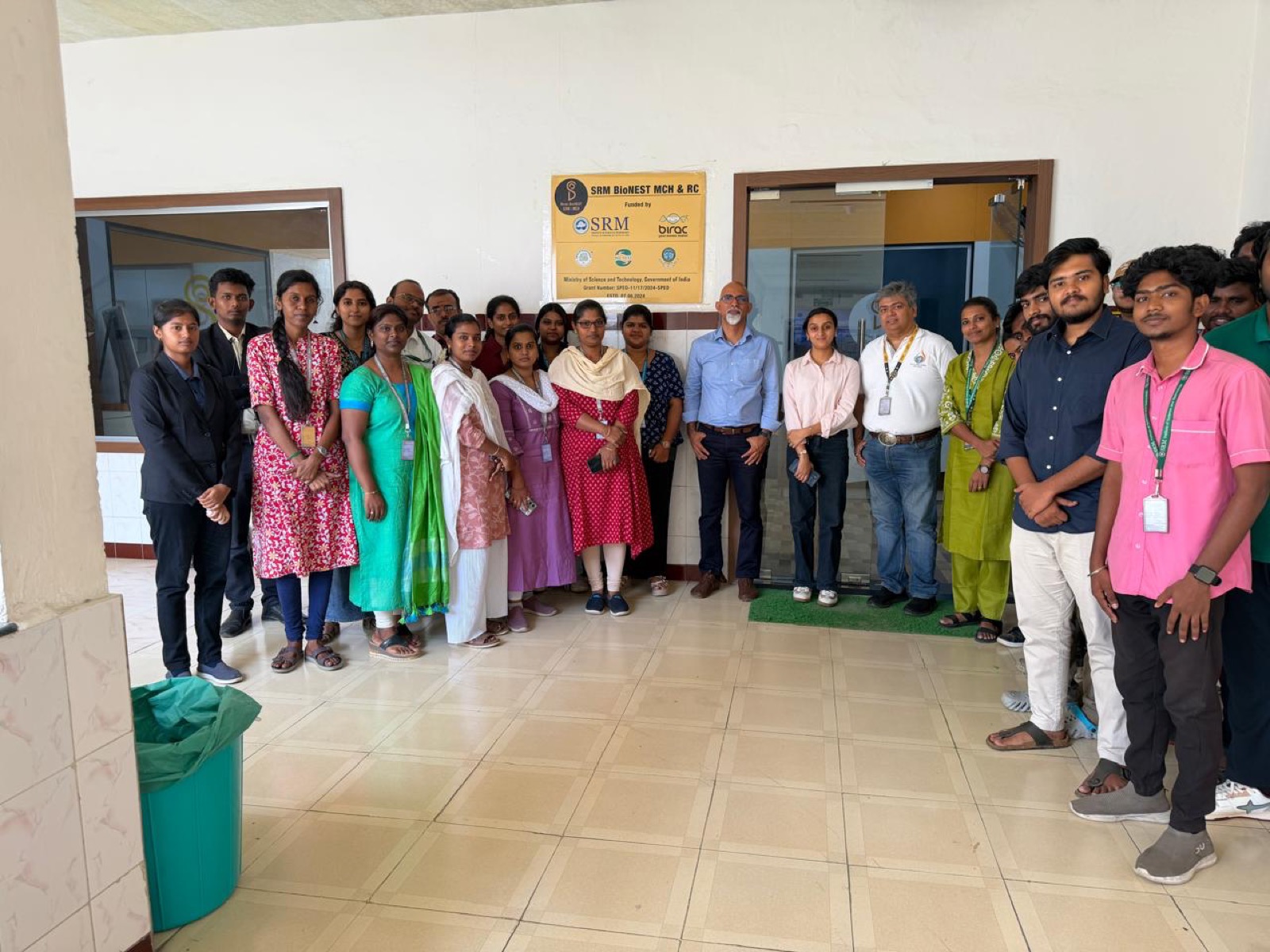 Visiting students with the team at the entrance of SRM BioNEST MCH and RC