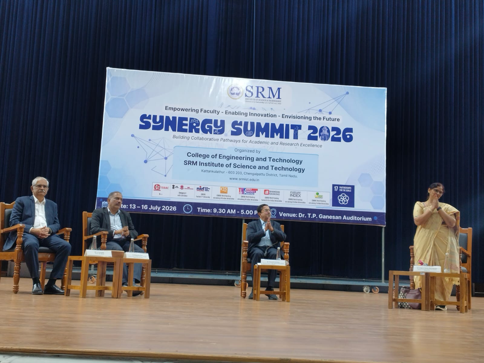 Panelists on stage at Synergy Summit 2026, Dr. T.P. Ganesan Auditorium, SRMIST