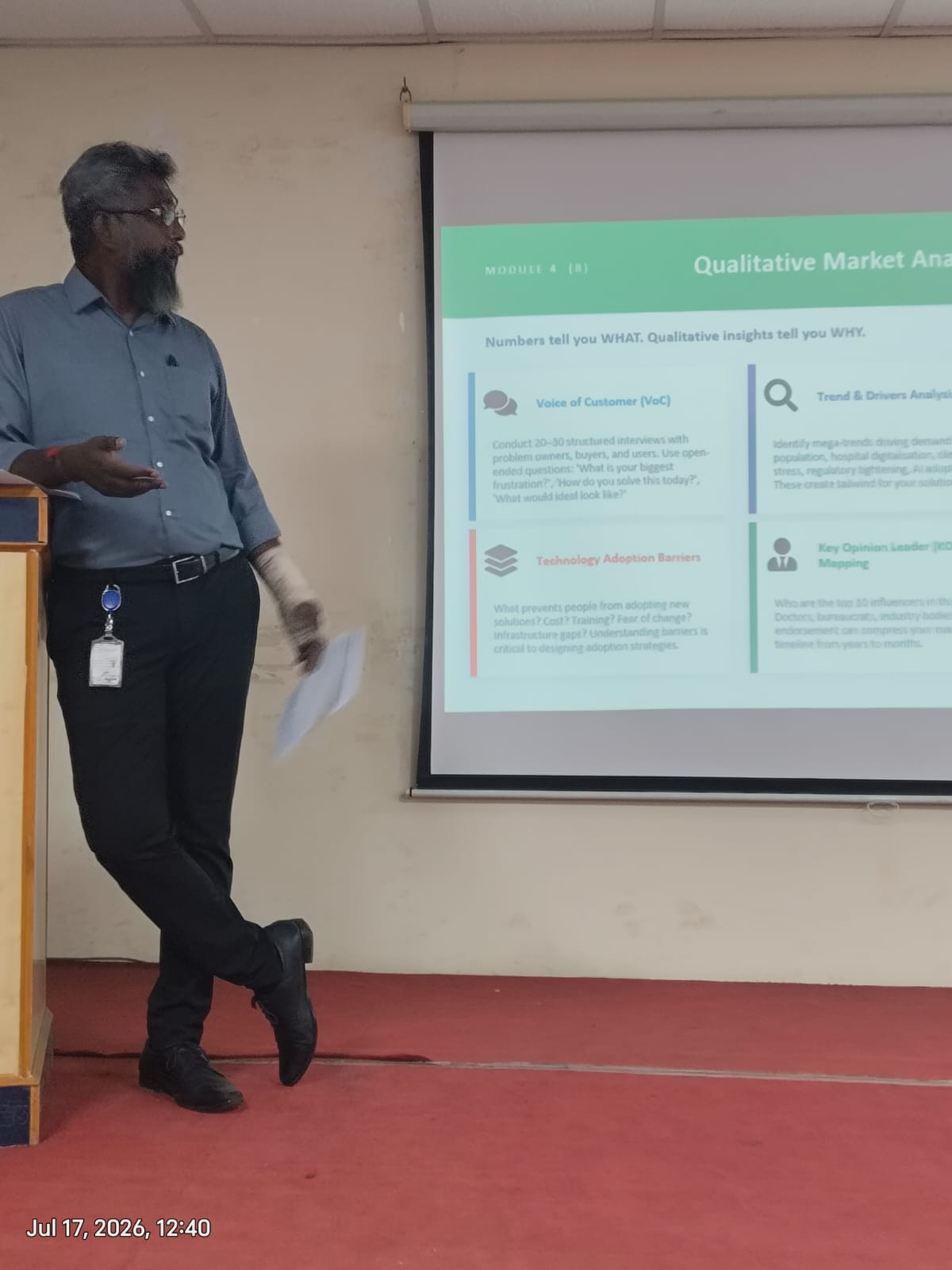 Speaker walking through qualitative market analysis at the Creating Value in Research session, SRMIST